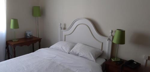 Postel nebo postele na pokoji v ubytování Hotel Vila Esteves