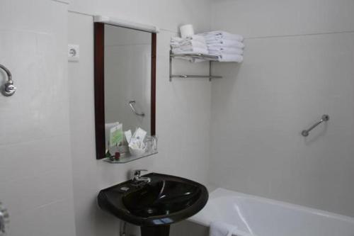 Koupelna v ubytování Hotel Vila Esteves