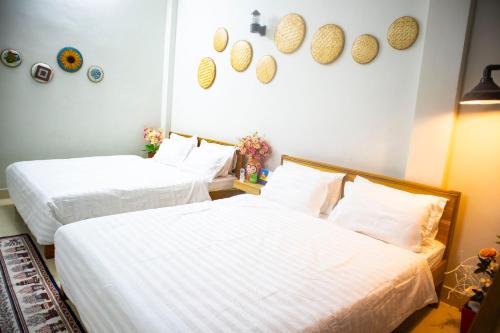 Postel nebo postele na pokoji v ubytování Memory Homestay Hue