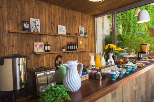 a kitchen with a counter with vases on it at Lemon Suites in Buenos Aires