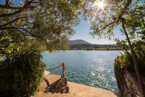 a view from the shore of a lake at Apartments Barbir in Ploče
