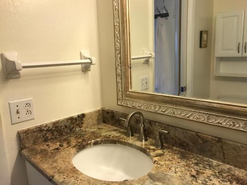 A bathroom at Crescent Arms Condominiums