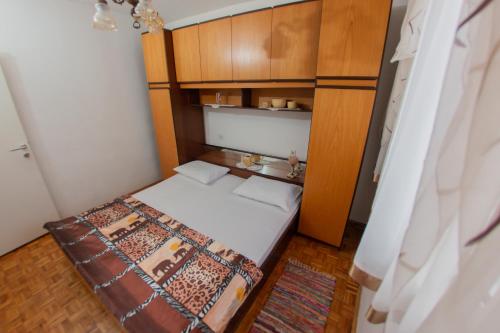 Posteľ alebo postele v izbe v ubytovaní Apartmani Sunset Rogotin