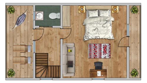a floor plan of a bedroom with a bed at Magnolia Resort Chalets in Vişeu de Sus