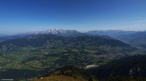 an aerial view of a valley with mountains in the background at Biobergbauernhof Bergzeit Apartment in Goldegg in Goldegg
