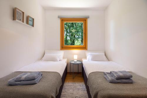 Ένα ή περισσότερα κρεβάτια σε δωμάτιο στο Villa Prisca