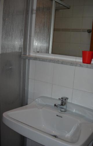 Ένα μπάνιο στο BED and BREAKFAST Pension Foidl