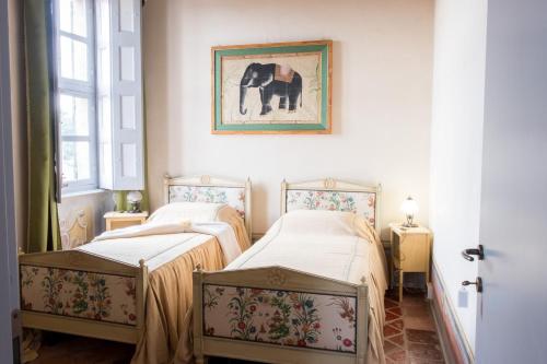 Кровать или кровати в номере Villa Rambaudi