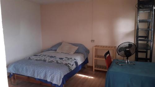 Postel nebo postele na pokoji v ubytování El laberinto hospedaje en casa
