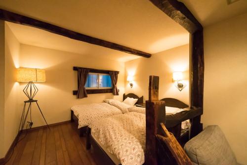 Voodi või voodid majutusasutuse Hotel Haus St Anton toas