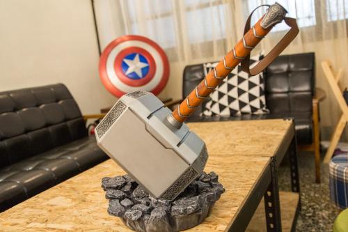 a marvel captain america sword on top of a table at 台東市區 童年時光六人包棟民宿 附廚房及電動麻將 in Taitung City