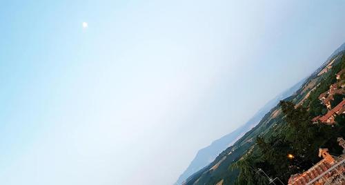 an image of a mountain with four squares at B&B Il Glicine in Montefollonico