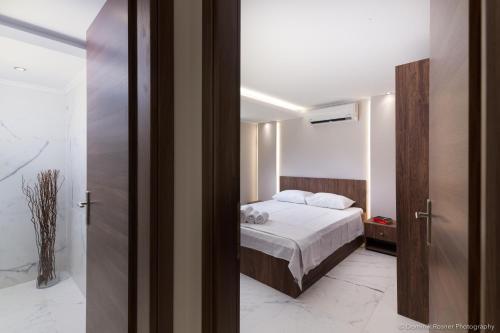 Cama o camas de una habitación en Seashore Stream Suites
