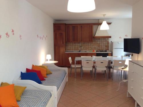 Kuchyň nebo kuchyňský kout v ubytování Residence La Giungla
