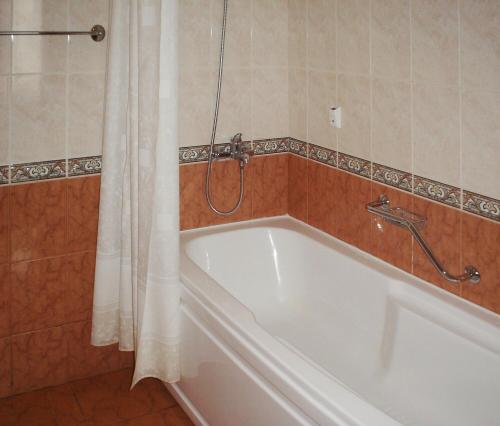 Ванная комната в Elegant Hotel