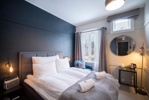 Postel nebo postele na pokoji v ubytování Villa Bryggekanten - by Classic Norway Hotels