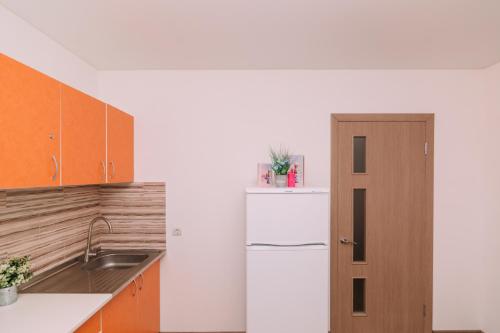 Η κουζίνα ή μικρή κουζίνα στο Apart-hotel on Kondrateva street New Building