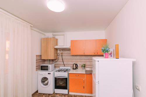 Η κουζίνα ή μικρή κουζίνα στο Apart-hotel on Kondrateva street New Building