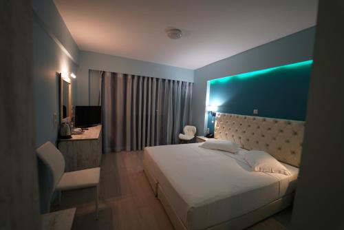 Ένα ή περισσότερα κρεβάτια σε δωμάτιο στο  Must Boutique Hotel & Restaurant