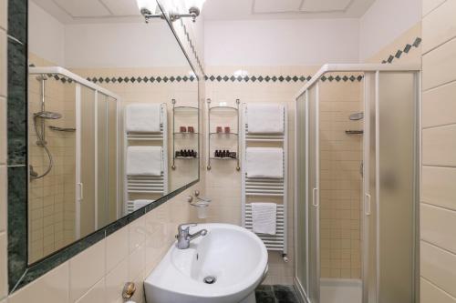 Ванная комната в Hotel Villa Delle Palme