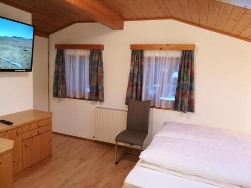 TV a/nebo společenská místnost v ubytování Apartments Pötscher