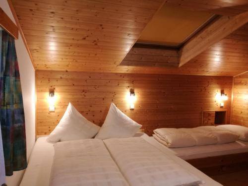 Postel nebo postele na pokoji v ubytování Apartments Pötscher