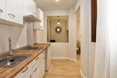 Kuchyňa alebo kuchynka v ubytovaní Apartamentos Los Lobos