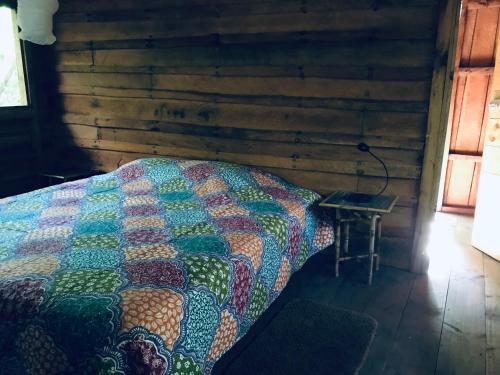 Ein Bett oder Betten in einem Zimmer der Unterkunft Serenity Beaches Resort