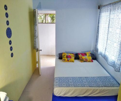 Säng eller sängar i ett rum på Riad Lola