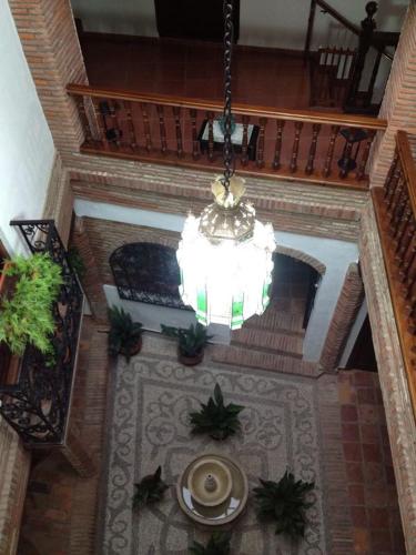 an overhead view of a chandelier in a building at Palacete Magistral Domínguez habitaciones in Guadix