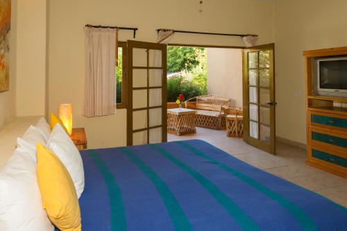 Ένα ή περισσότερα κρεβάτια σε δωμάτιο στο Tripui Hotel