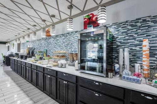 a long buffet line in a fast food restaurant at Quality Inn Forrest City I-40 in Forrest City