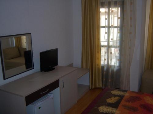 Μια τηλεόραση ή/και κέντρο ψυχαγωγίας στο Apartmani Marija
