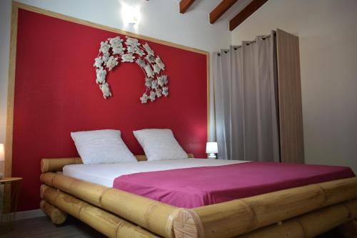 Postel nebo postele na pokoji v ubytování MAISON TI BAMBOU