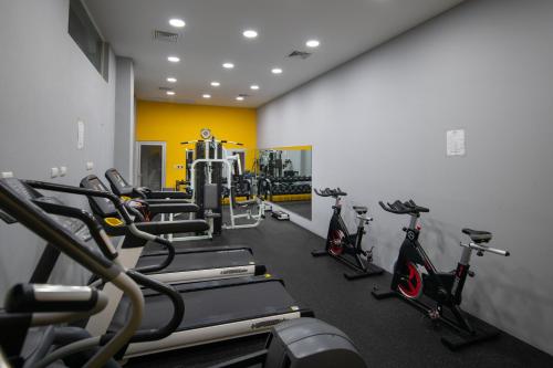 a gym with several treadmills and cardio machines at Casa Marina Beach & Reef All Inclusive in Sosúa