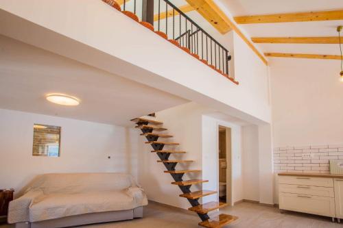 Postel nebo postele na pokoji v ubytování Apartmani Kraj mora