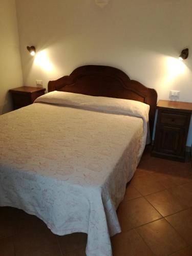 Ένα ή περισσότερα κρεβάτια σε δωμάτιο στο Agriturismo Sant'Erasmo