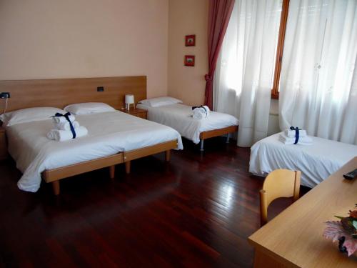 Postel nebo postele na pokoji v ubytování Al Borgo