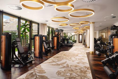 a fitness room with treadmills and exercise equipment at Grantley Hall in Ripon
