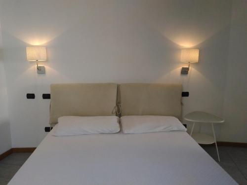 Cama o camas de una habitación en Villa Bungaville a Olbia