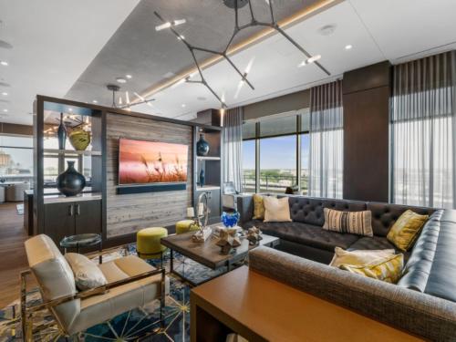 a living room with a couch and a table at Global Luxury Suites Bethesda Chevy Chase in Bethesda