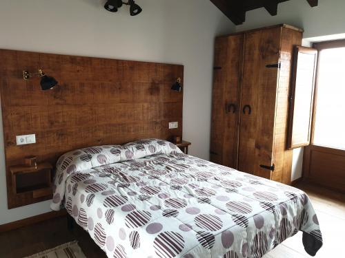 Posteľ alebo postele v izbe v ubytovaní Apartamento del Abuelo