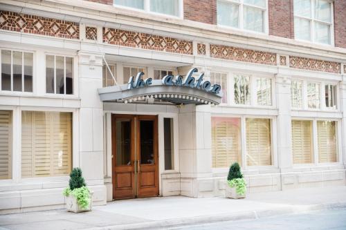 a building with a sign that reads the ghetto at The Ashton Hotel in Fort Worth