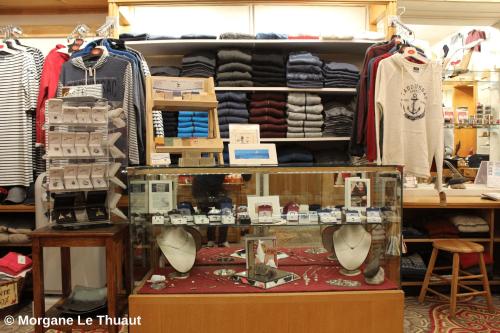 a display case in a store filled with clothes at Hotel Tadoussac in Tadoussac