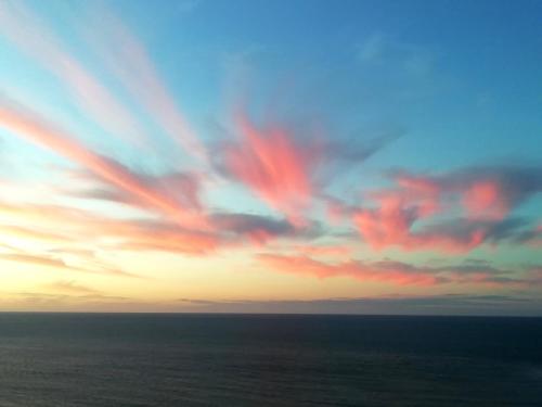 a cloudy sky over the ocean at sunset at Beach Class Rosalux 707 in Fortaleza