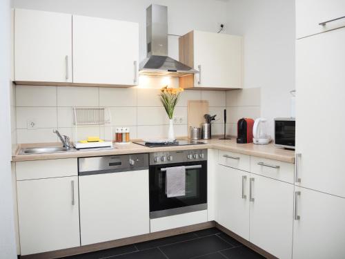 Kjøkken eller kjøkkenkrok på flex living - Apartment Nikolai