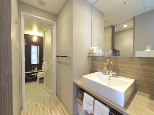 Meitetsu Inn Nagoyaeki Shinkansenguchi tesisinde bir banyo