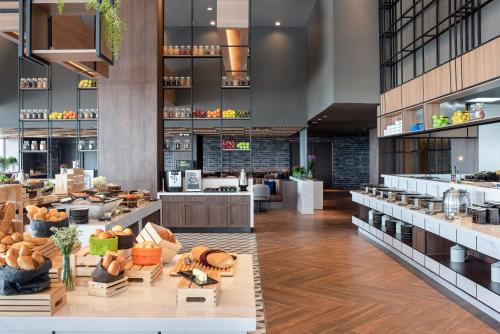 a view of a restaurant with a bakery at Avani Sukhumvit Bangkok Hotel in Bangkok