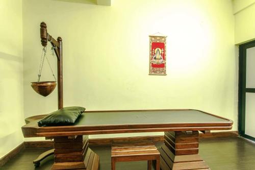 a mattress sitting on a table in a room at Nepal Ayurveda Home in Kathmandu