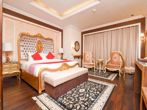Postel nebo postele na pokoji v ubytování Ras Al Khaimah Hotel